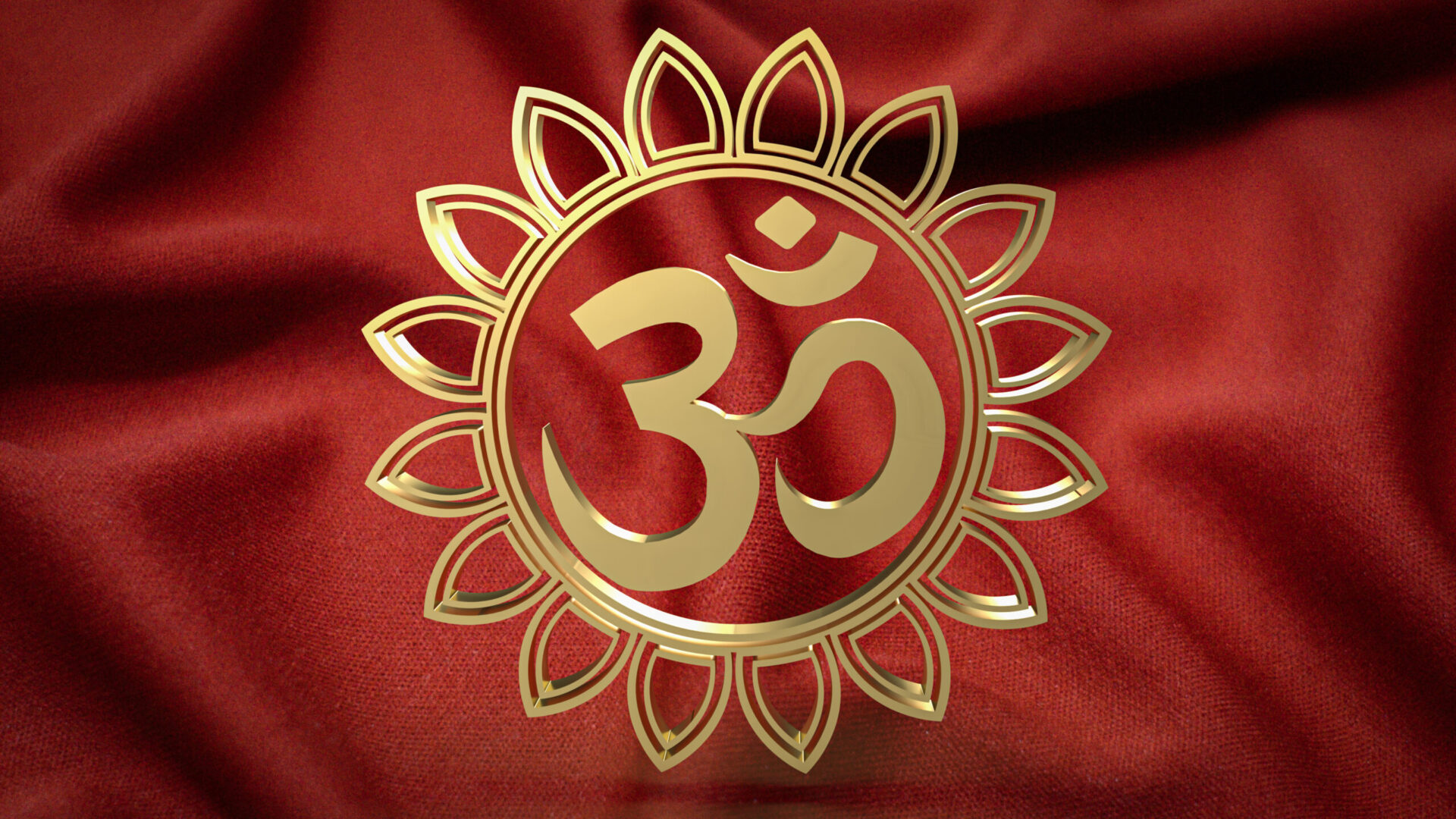 Golden Om symbol on red fabric